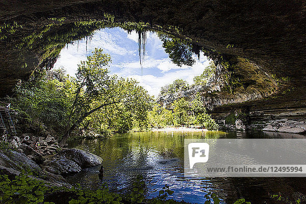 Near Wimberley  Texas  the Hamilton Pool is a popular swimming hole for tourists and locals in the hot  dry summer.