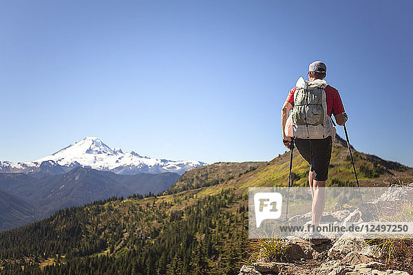 Male Hiker In North Cascades National Park With The View Of Mount Baker