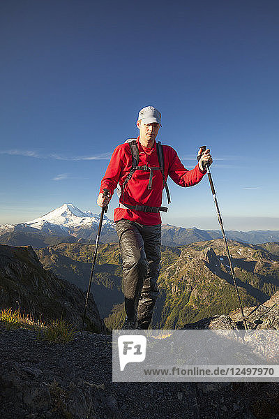 Male Hiker Hiking On Mountain Landscape In North Cascades National Park