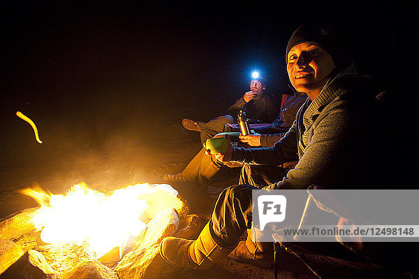 Maria Hidalgo and Dave Steiner enjoys the campfire in Moab  Utah