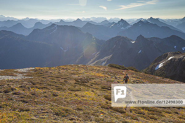 Distant View Of Male Backpacker In North Cascades National Park