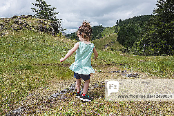 Young Girl Dancing On A Mountain Near Eugene  Oregon