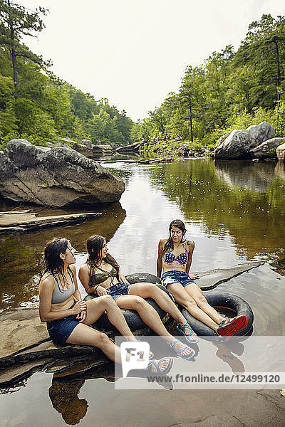 Three young women hike through and swim at Little River Canyon National Preserve.