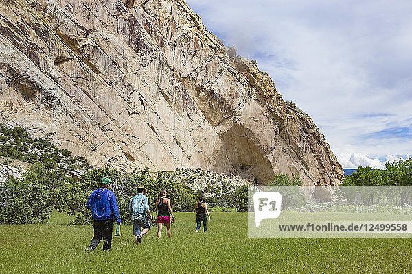 People Hiking Through Dinosaur National Monument  Utah  Usa