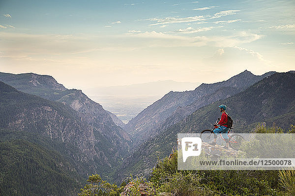 Brandon Peterson stops for a mid ride overlook in American Fork Canyon  Utah