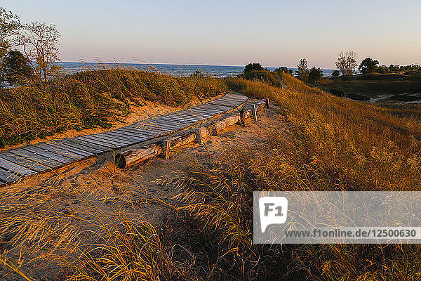 Boardwalk in Kohler-Andrae State Park in Sheboygan  Wisconsin offers camping and 2.5 miles of sandy beach.