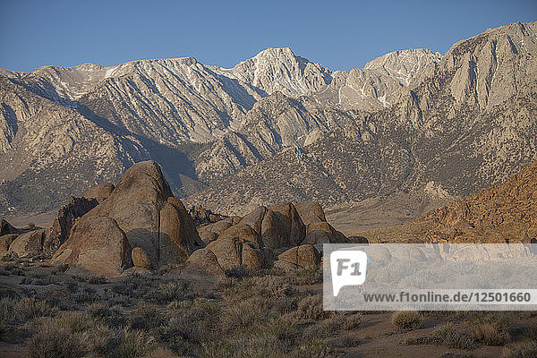 Woman Trail Running In The Alabama Hills Recreation Area Near Lone Pine California