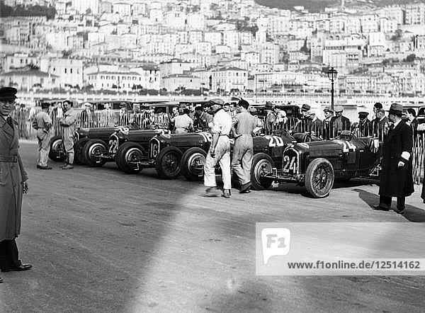 A line of Alfa Romeos at the Monaco Grand Prix  1934. Artist: Unknown