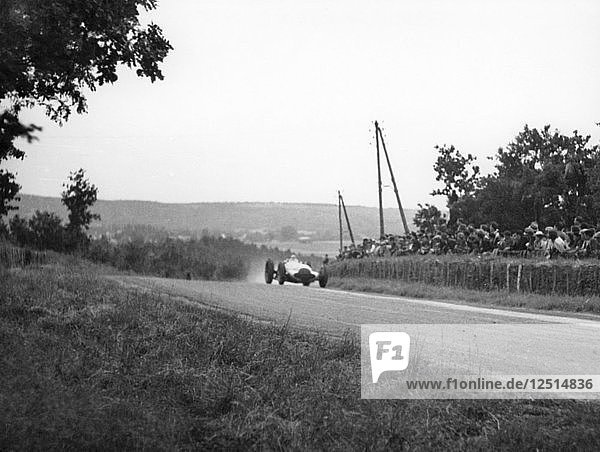Rudolf Caracciola in his Mercedes  French Grand Prix  Rheims  1938. Artist: Unknown