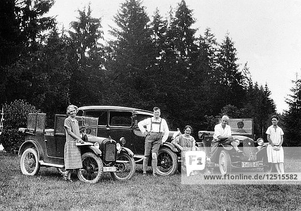 A group of people on an outing with their cars  c1929-c1930. Artist: Unknown