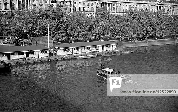 A police launch  Thames River Police station  Victoria Embankment  London  c1945-c1965. Artist: SW Rawlings