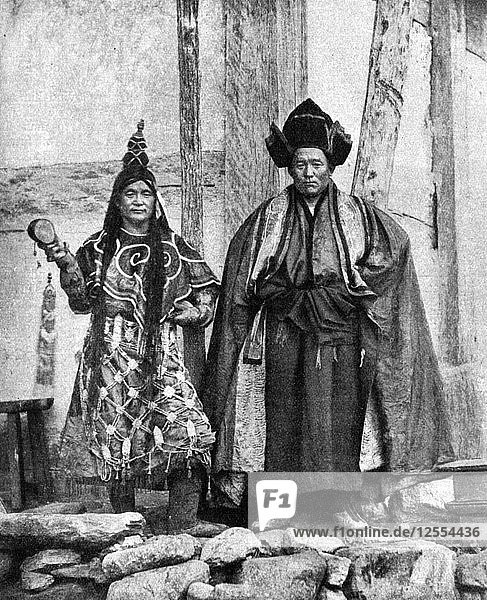 Lamist priests of Sikkim wearing robes  Talung monastery  India  1922.Artist: John Claude White