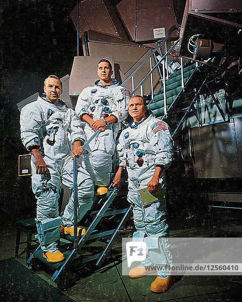 The crew of Apollo 8 in front of a simulator  1968.Artist: NASA