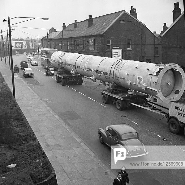 An absorption tower being transported by road  Dukenfield  Manchester  1962. Artist: Michael Walters