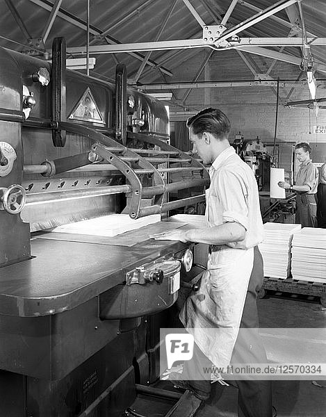 Page cutting guillotine in use at a South Yorkshire printing company  1959. Artist: Michael Walters