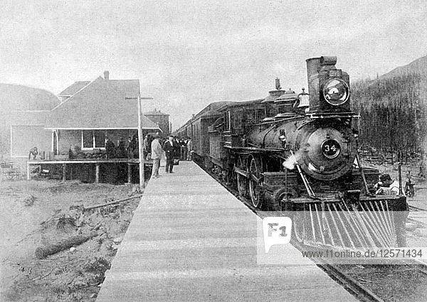 The first regular trans-continental train at Fernie  British Columbia  Canada  1886 (1951). Artist: Unknown