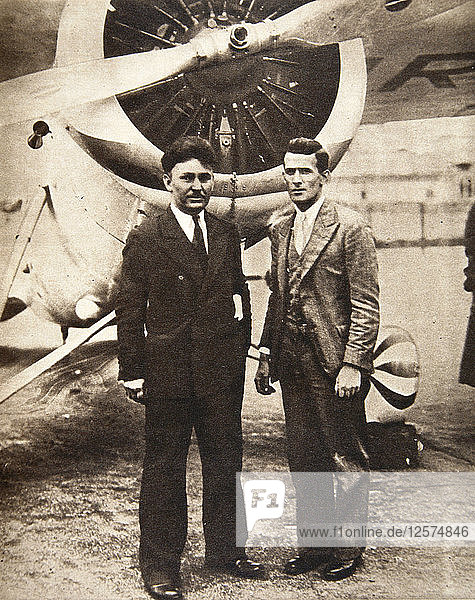 Aviators Wiley Post and Harold Gatty in front of Winnie Mae  New York  USA  1931. Artist: S and G