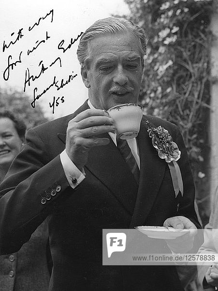 Anthony Eden  British Conservative politician  drinking a cup of tea  1955. Artist: Unknown