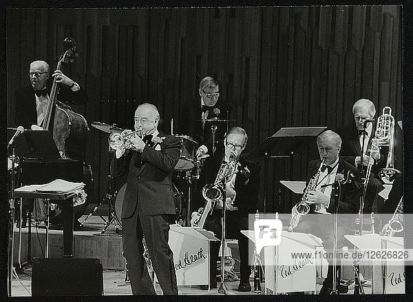 The Ted Heath Orchestra in concert  London 1985. Pictured are Lennie Bush (double bass)  Kenny Baker Artist: Denis Williams