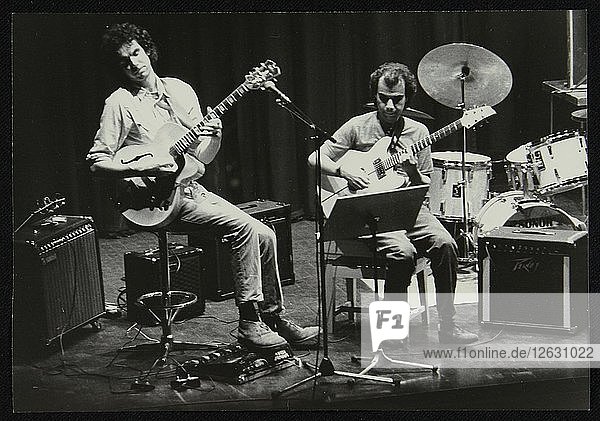 John Etheridge and Gary Boyle playing at Campus West Welwyn Garden City  Hertfordshire  1984. Artist: Denis Williams