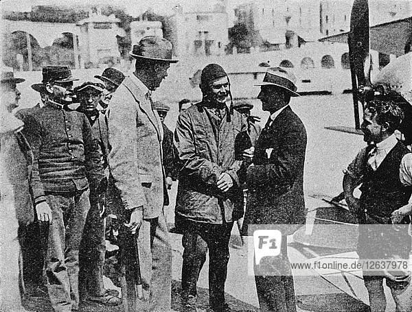 The Schneider Trophy: Howard Pixton talking to Jacques Schneider after his victory 1914 (1934). Artist: Flight Photo.