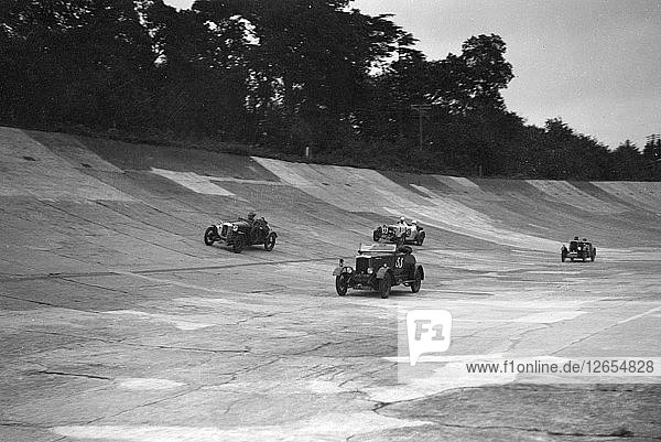 Cars racing on the banking at a JCC Members Day  Brooklands. Artist: Bill Brunell.