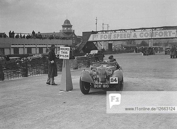 Riley Sprite of Kay Hague competing in the JCC Rally  Brooklands  Surrey  1939. Artist: Bill Brunell.