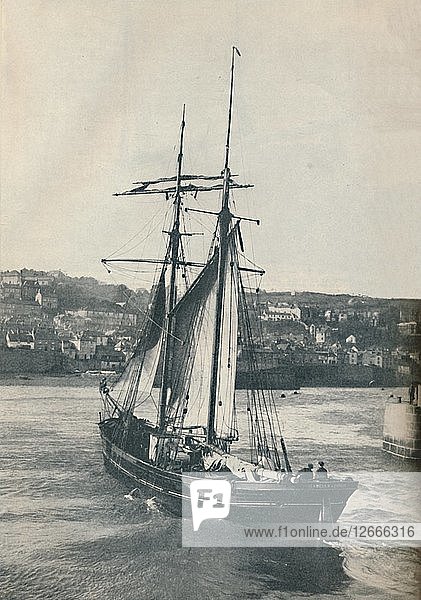 Sailing Into Newlyn Harbour  the Isabella  a two-masted Lancashire type schooner  1937 Artist: Unknown.