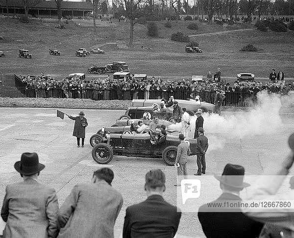 Cars on the start line at a BARC race meeting  Brooklands  1930. Artist: Bill Brunell.