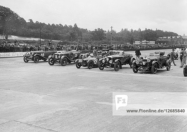 Cars on the start line at the JCC Members Day  Brooklands  4 July 1931. Artist: Bill Brunell.