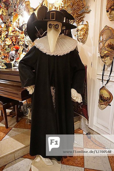 Plague doctor costume in a mask and costume shop. Venice,  Veneto,  Italy,  Europe.