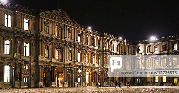 Paris  1st arr.  museum of Louvre  square court of night. Tourists.