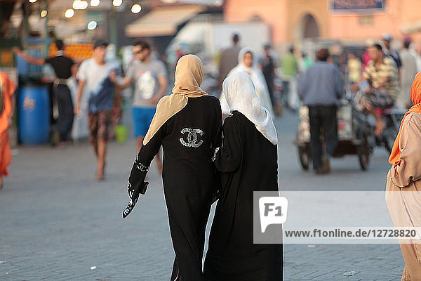 'Moroccan wearing a chador with ''Chanel'' logo. Marrakech. Morocco.'