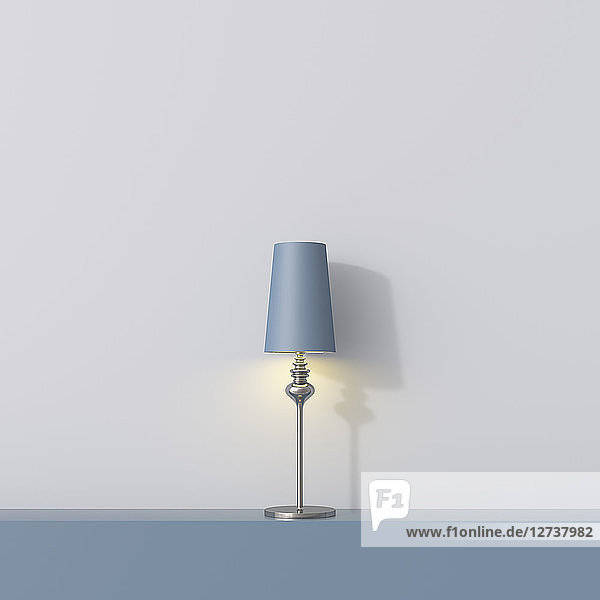 3D rendering  Table lamp on shelf with blue lampshade