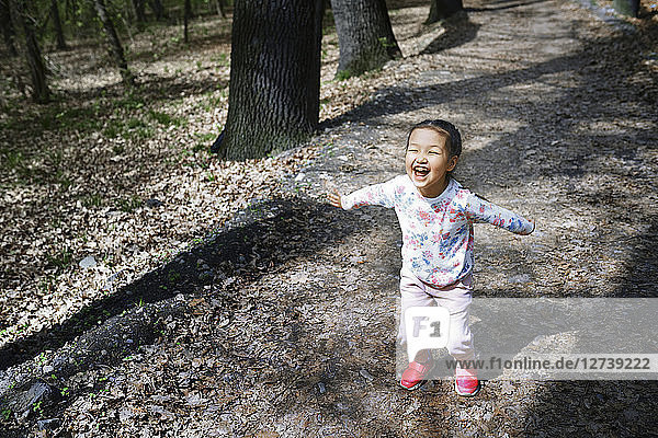 Little girl having fun in a park