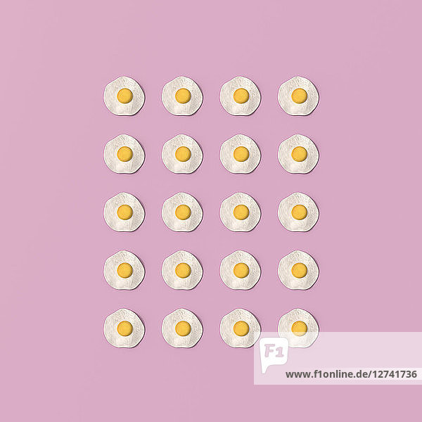 3D rendering  Rows of fried eggs on pink background