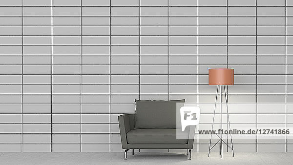 3D rendering  Gray armchair and floor lamp against tiled wall
