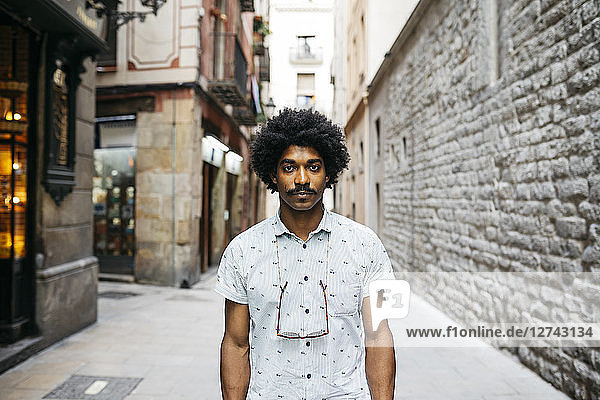 Spain  Barcelona  portrait of man with moustache and curly hair