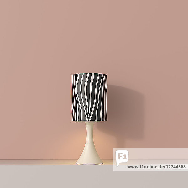 3D rendering  Table lamp on shelf with zebra stripe lampshade