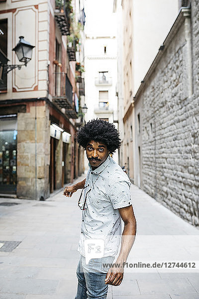 Spain  Barcelona  portrait of man with moustache and curly hair