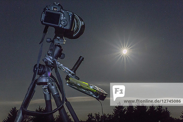Germany  Hesse  Hochtaunuskreis  Equipment used for astro photography  photographing a full moon eclipse