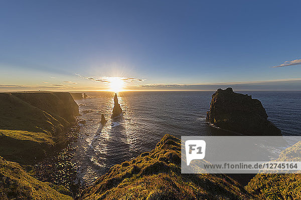 UK  Scotland  Caithness  Coast of Duncansby Head  Duncansby Stacks at sunrise