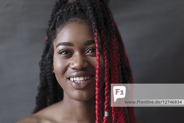 Portrait smiling  confident young woman with red braids