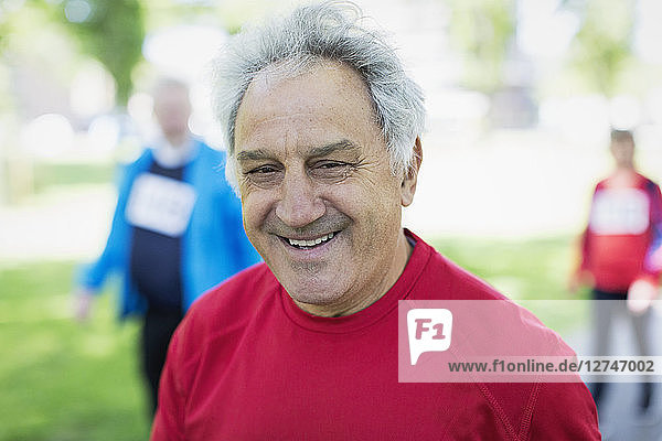 Portrait smiling  confident senior man in park