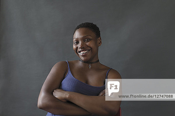 Portrait smiling  confident woman with arms crossed