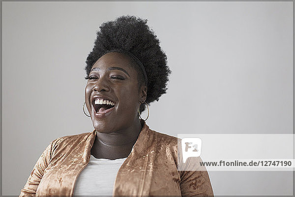 Carefree woman laughing