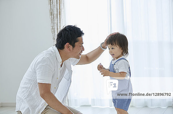 Japanese father and son at home