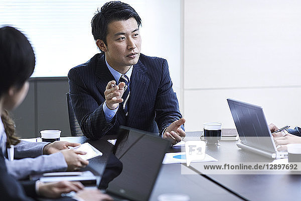 Japanese businesspeople in a meeting