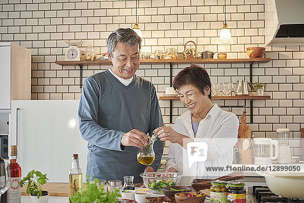 Japanese senior couple in the kitchen