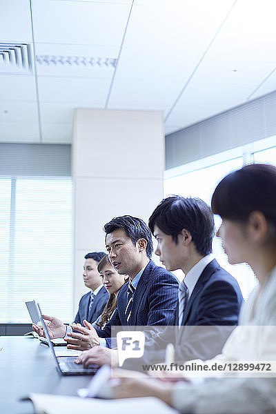 Japanese businesspeople in a meeting